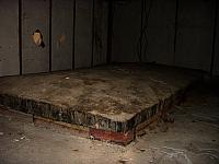 Kies-Druckwellendämpfer in der Tarnbaracke